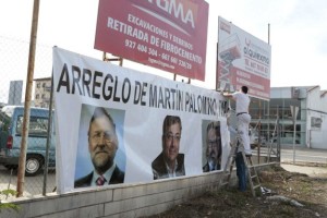 Cartel de protesta en Martin Palomino